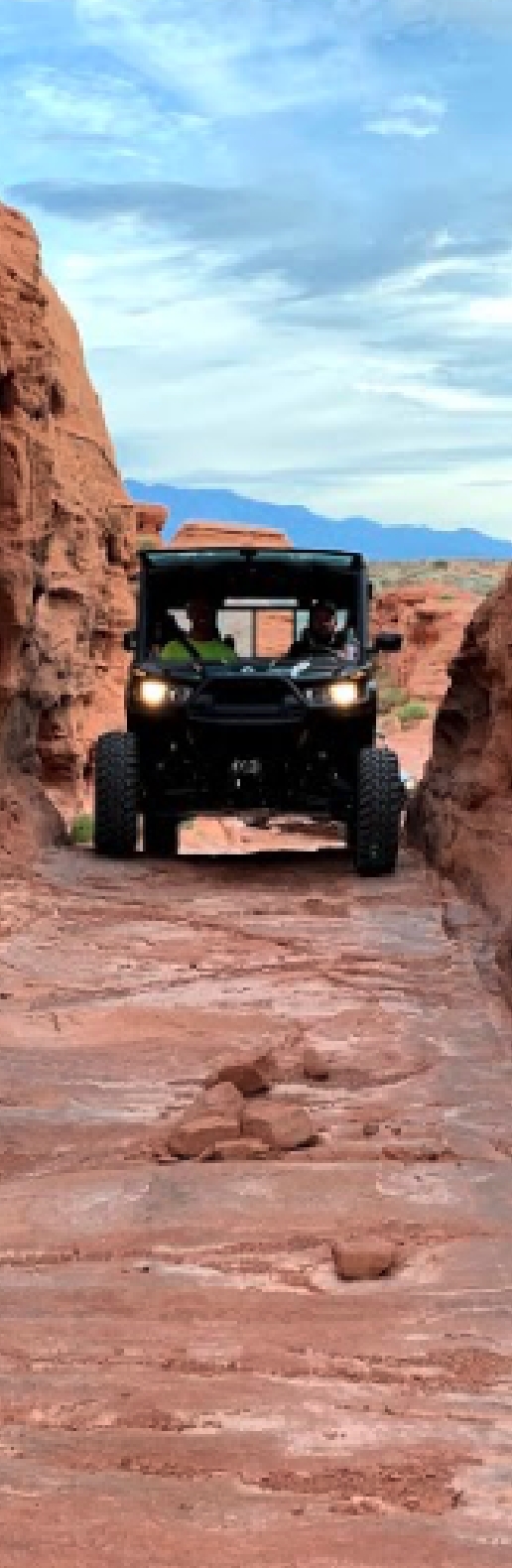 Zonos employees have fun on a side by side atv.